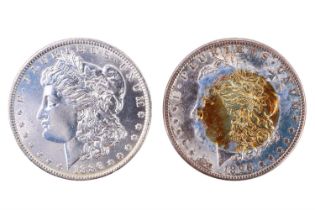 Two silver US Morgan Dollars, 1886 and 1896