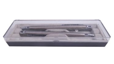 A pen and propelling pencil pair in a Parker case