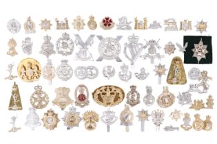 A quantity of British military Staybrite cap and other badges