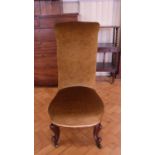 A Victorian carved walnut and upholstered Prie Dieu / nursing chair, 105 cm high