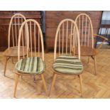 Four mid-to-late 20th Century Ercol elm and beech dining chairs, including a carver, 96 cm high