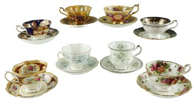 Eight cabinet cups and saucers including Royal Albert, Aysley, etc