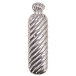A Victorian silver perfume flask, having helical reeded decoration and a hinged lid enclosing a