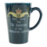 A 1976 '75th Anniversary of the Submarine Service' mug, 14.5 cm