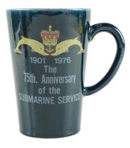 A 1976 '75th Anniversary of the Submarine Service' mug, 14.5 cm