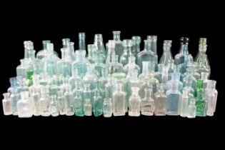 A collection of largely Victorian glass bottles including the Black Bull Hotel, Carlisle, J Tiffen'