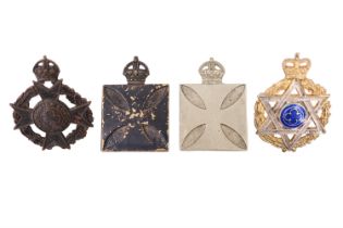 Four Army Chaplains' cap badges