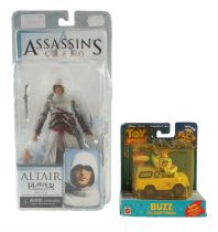 An Assassins Creed figure together with a Toy Story 2 Buzz diecast vehicle