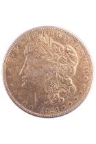 A 1921 silver US Morgan Dollar, San Francisco Mint, brooch pin affixed