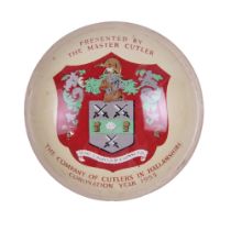 A 1953 'The Company of Cutlers in Hallamshire' presentation glass paperweight, 87 mm diameter