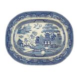 A blue-and-white Willow pattern ashet, 46 cm x 36 cm