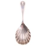 A vintage silver caddy spoon, having a shell form bowl and stylized palmette terminal, W I