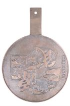 A Japanese bronze hand mirror, relief decorated with garden scenes within geometric reserves and