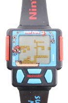 A Nintendo Super Mario Bros 3 watch by Zeon, 1990, 8319 UC, 41 mm, (not running, may require new