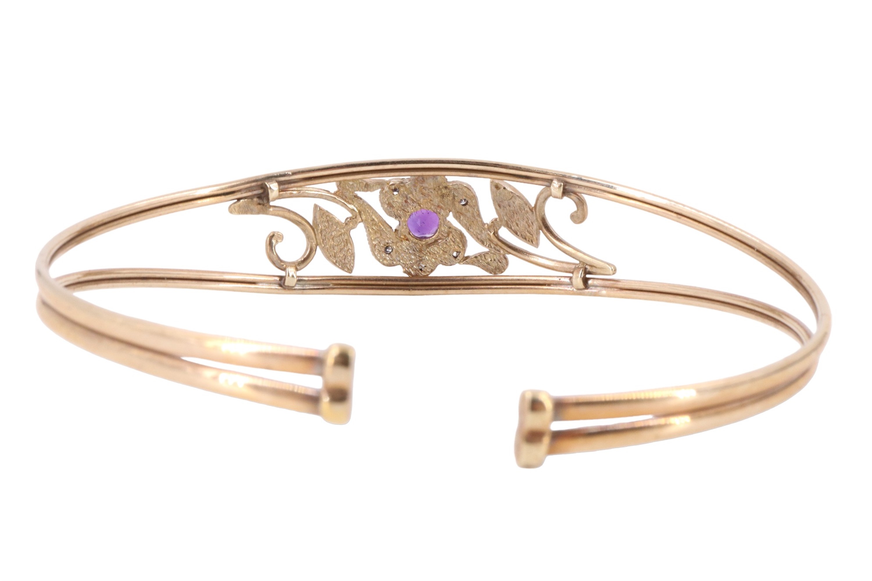 A contemporary amethyst and white stone set floral bangle, having a 5 mm amethyst brilliant - Image 2 of 3