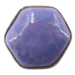 An Art and Crafts Ruskin pottery ceramic and white metal brooch, the hexagonal glazed cabochon bezel