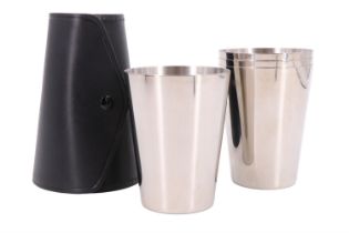 A nested set of stainless steel travel beakers in hide travel case and carton by W A Goold