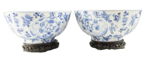 A pair of Chinese reproduction blue and white punch bowls and stands, 30 cm x 18 cm, on stand