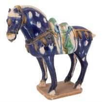 A reproduction Tang Chinese glazed earthenware horse, 22 cm