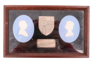 A framed Wedgwood 1977 Silver Jubilee commemorative, having two Jasperware portraits and white metal