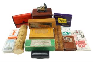 A group of vintage games including an antler cribbage board, Bezique and other playing cards,