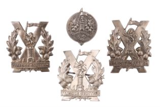 Four variant patterns of Tyneside Scottish cap badges