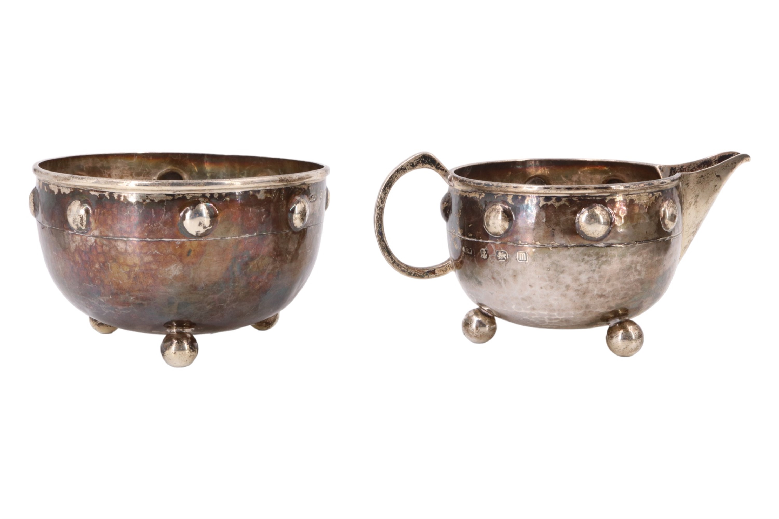 An Arts and Crafts silver bachelor tea set, of shouldered ovoid form and having a planished finish - Image 7 of 9
