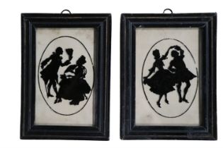 A pair of 1920s reverse painted silhouettes on glass, in ebonised period frames under glass, 16 cm x