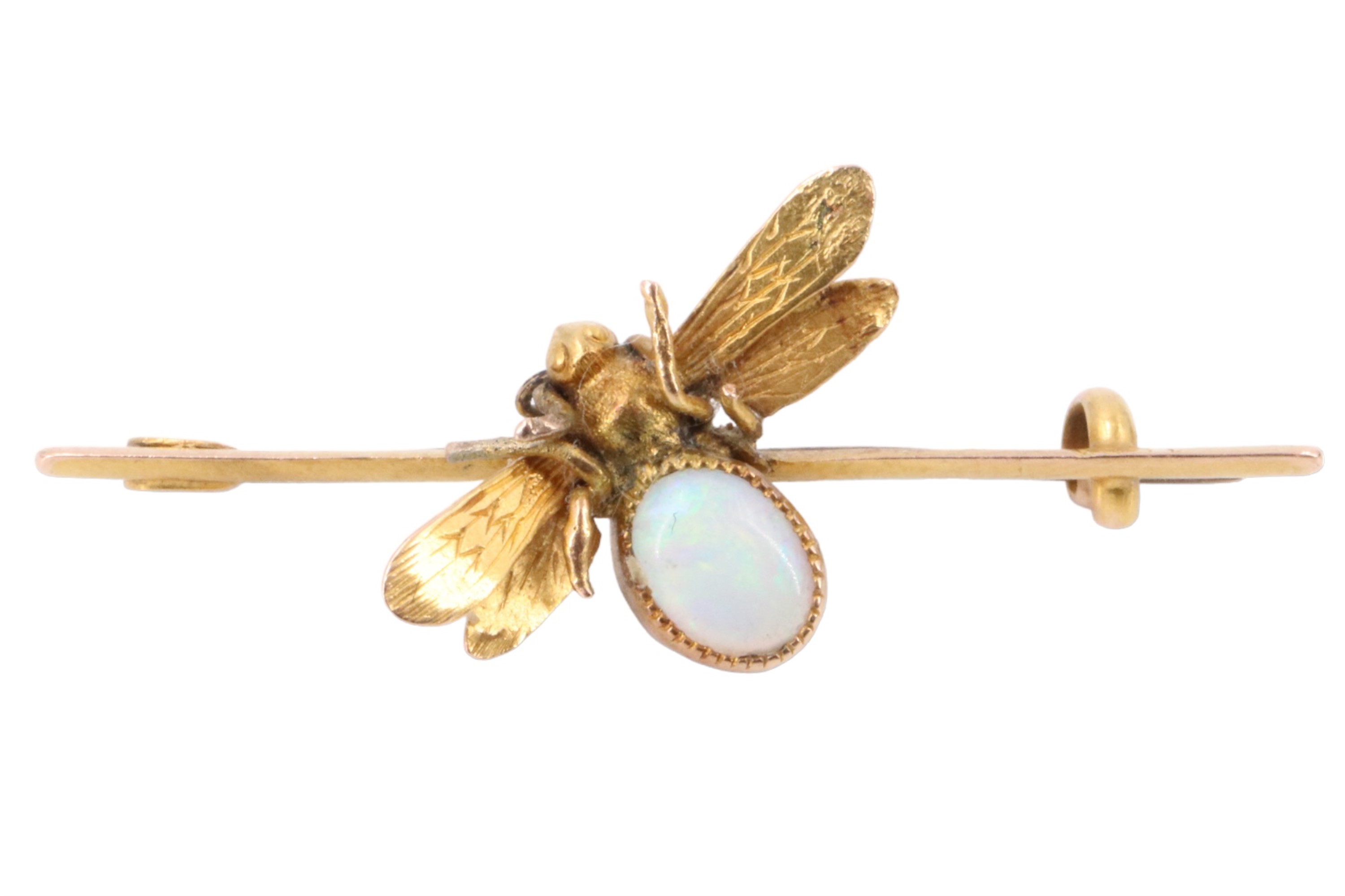 A late 19th / early 20th Century opal and 15 ct yellow metal bug brooch comprising a winged insect