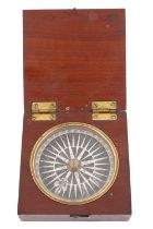 A Georgian pocket magnetic compass, having a printed paper rose and brass-mounted mahogany case, 8