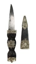 A Victorian army officer's sgian dubh, its horn grip bearing a badge of the Highland Light Infantry,
