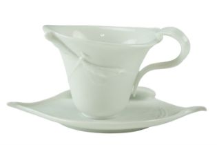 A Franz dragonfly cup and saucer, boxed