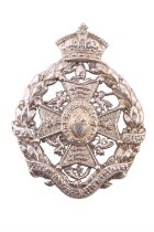 A 24th Middlesex Rifle Regiment officer's white metal cap badge, stamped Silver and tested as such