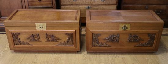 A pair of carved Oriental camphor chests, late 20th century, 92 x 44 x 47 cm