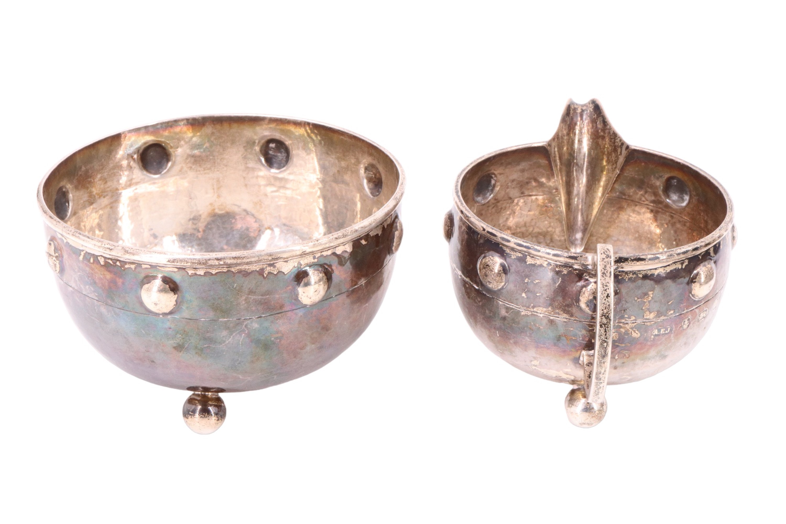 An Arts and Crafts silver bachelor tea set, of shouldered ovoid form and having a planished finish - Image 8 of 9