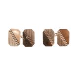 A pair of 9 ct gold cufflinks, each of canted oblong shape having linear engraving, 1967, 4.1 g