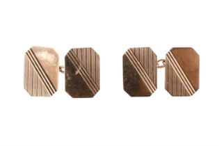A pair of 9 ct gold cufflinks, each of canted oblong shape having linear engraving, 1967, 4.1 g