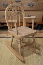 A child's late 20th Century beechwood rocking chair, 60 cm