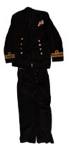 A 1940s Royal Navy lieutenant commander's tunic, trousers, cap covers and commission document