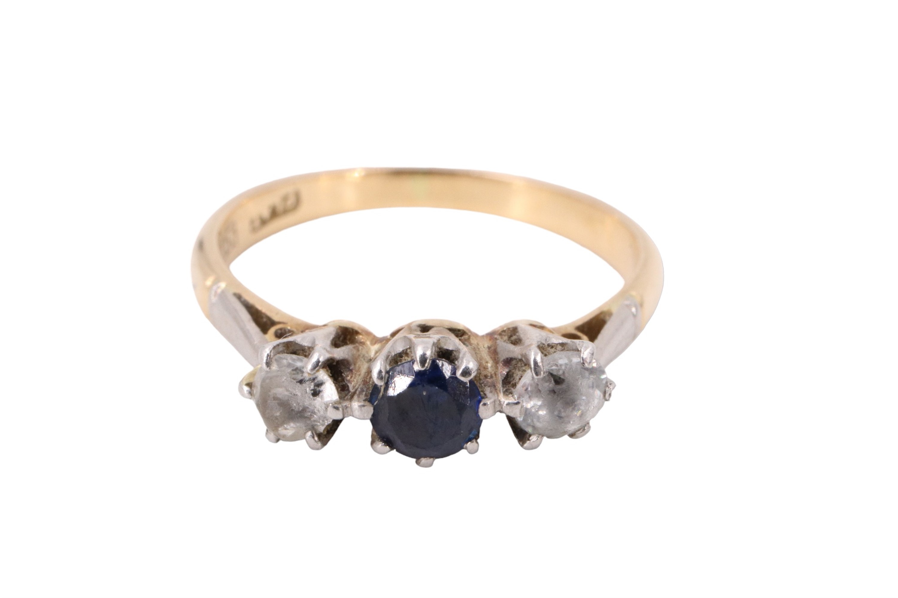 A sapphire and spinel three stone finger ring, having a 4 mm blue sapphire between two white - Image 2 of 5