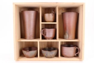 Nanba Shusaku (b. 1942) A boxed late 20th Century Japanese Bizen Ware tea set, tallest 13 cm