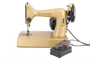 A vintage Singer electric sewing machine, circa 1950s