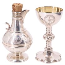 A Victorian travelling communion set, comprising a gilt lined chalice, having a pierced hexagonal