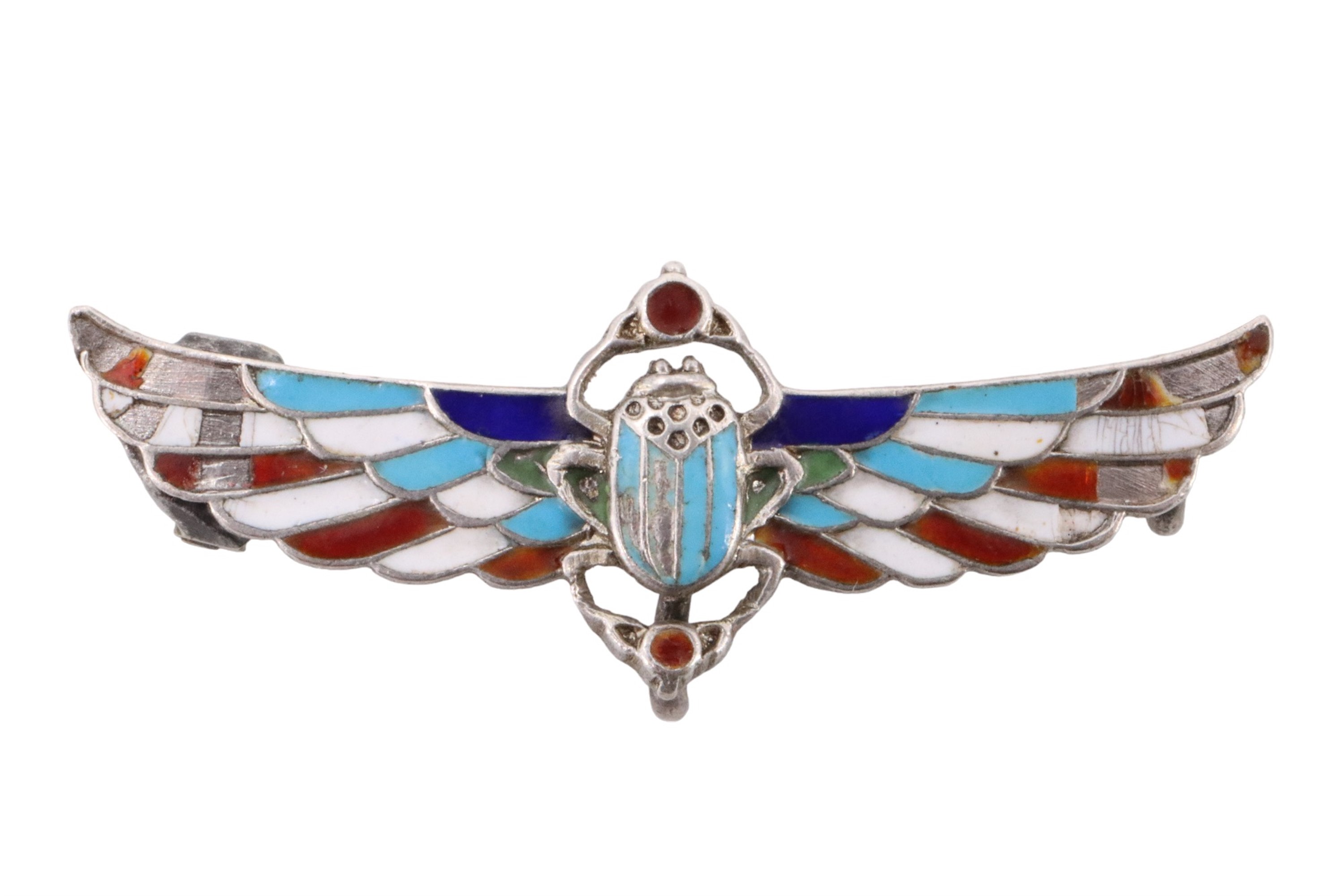 A late 19th / early 20th Century Egyptian Revival enamelled 800 standard white metal brooch in the