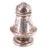 An early 20th Century silver pepperette, of compressed baluster form having a slip fit lid and