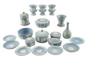 A quantity of Wedgwood blue Jasperware including five lidded boxes, vases, etc