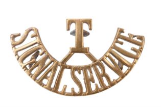 A Territorial Signal Service brass shoulder title