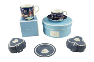 A Wedgwood Blue Pagoda cup and saucer together with cup and three items of Portland Blue