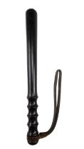 A vintage lignum vitae police truncheon, 39 cm