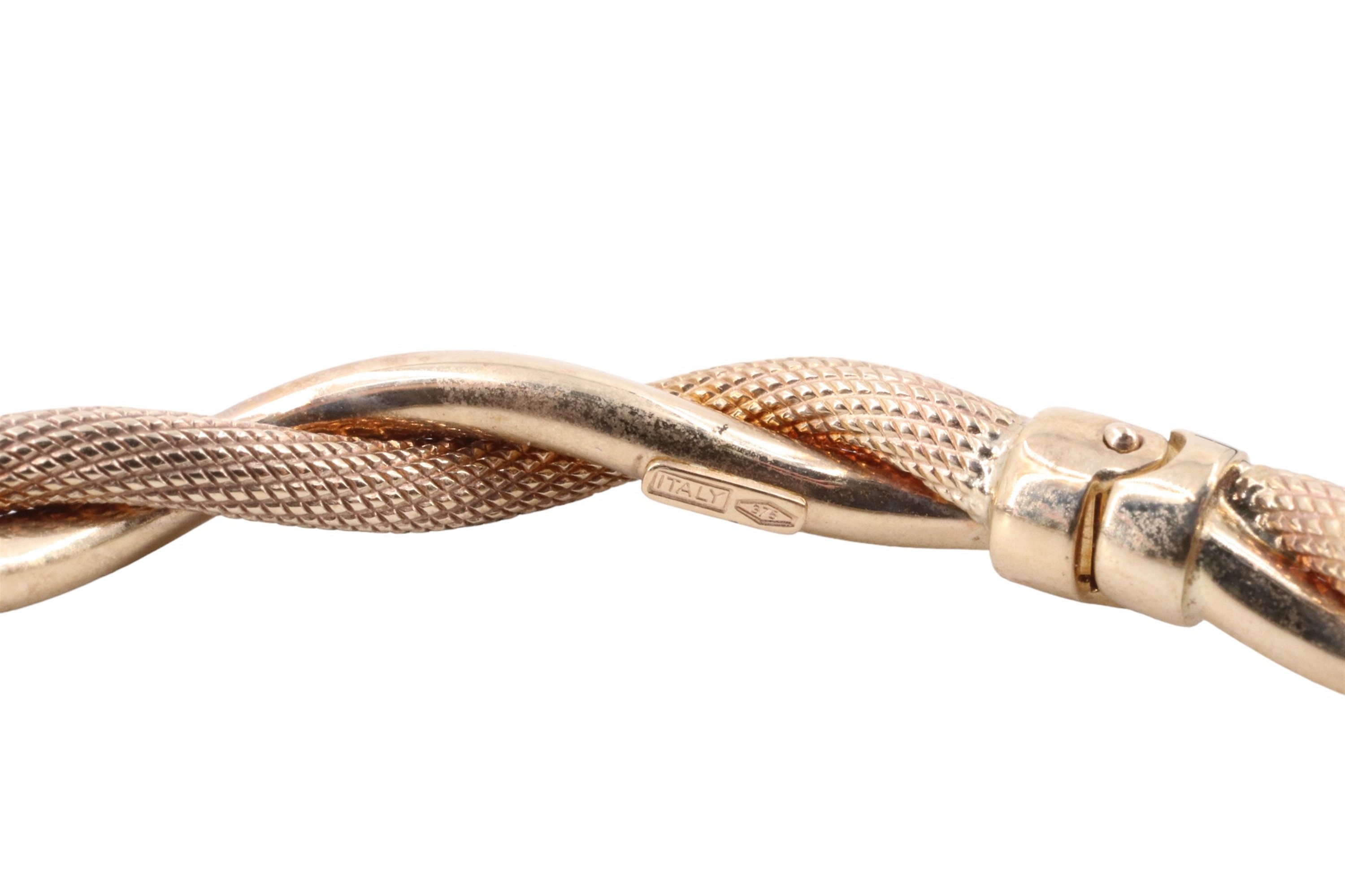 A contemporary Italian 9 ct gold cable bangle, having polished and textured twists, sprung hinge - Image 3 of 3